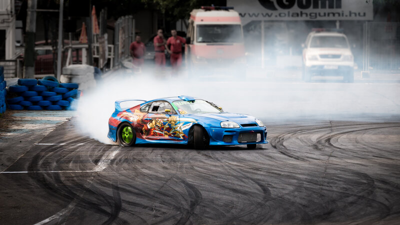 Blue Drift Car — Dramatic, Afternoon