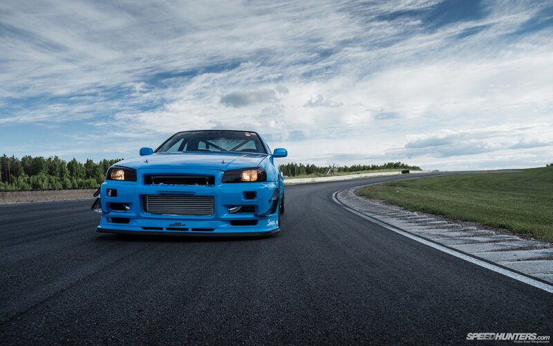 Blue drift car on a racetrack