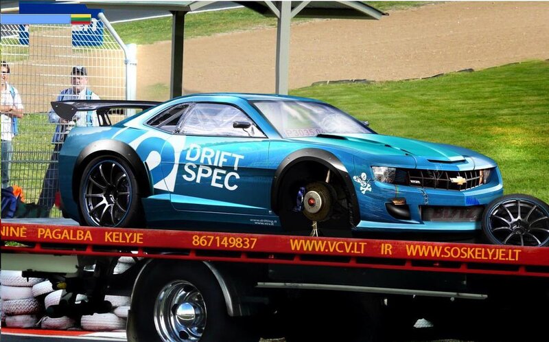 Blue drift car on tow truck