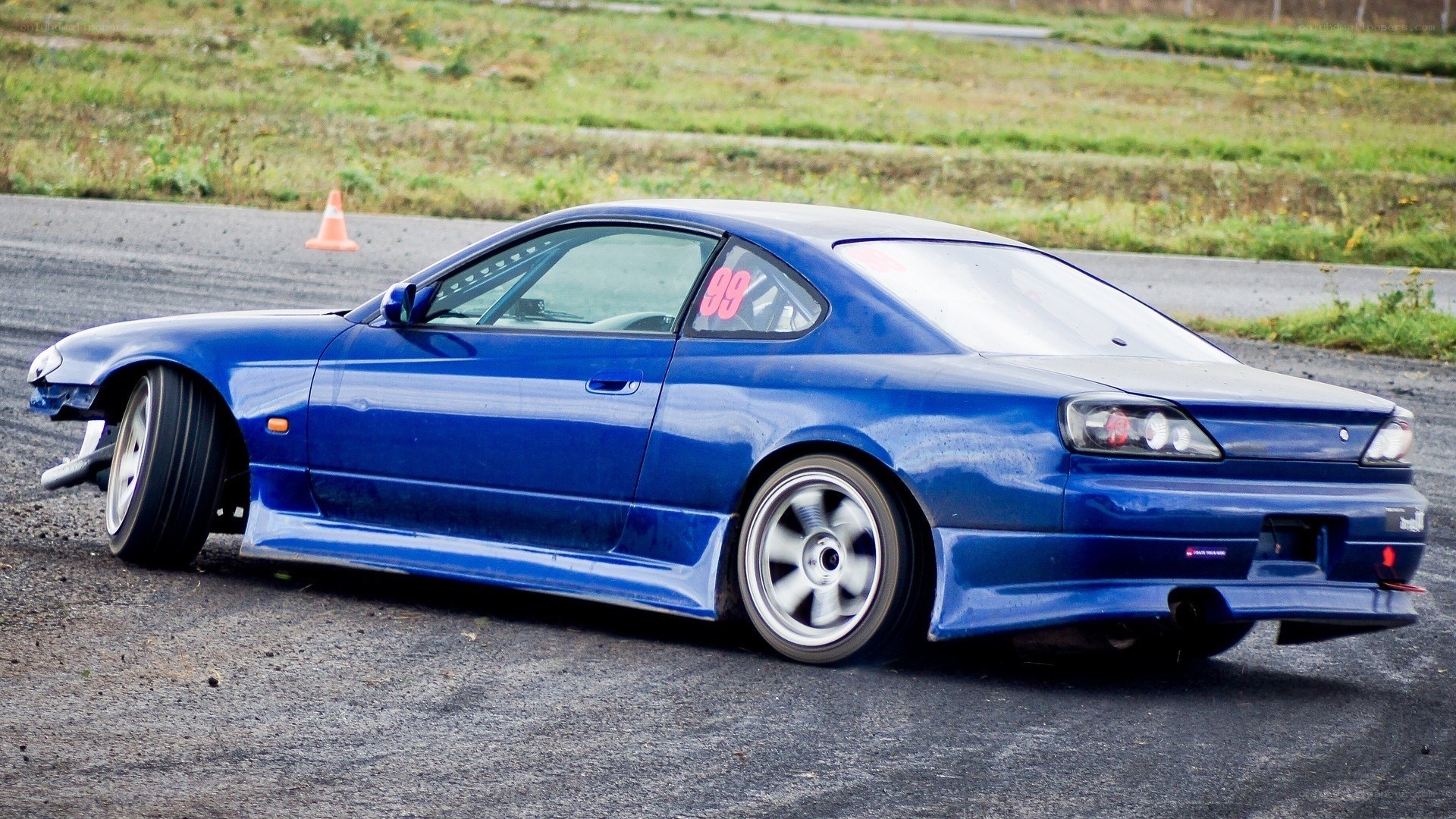 blue drift car on track