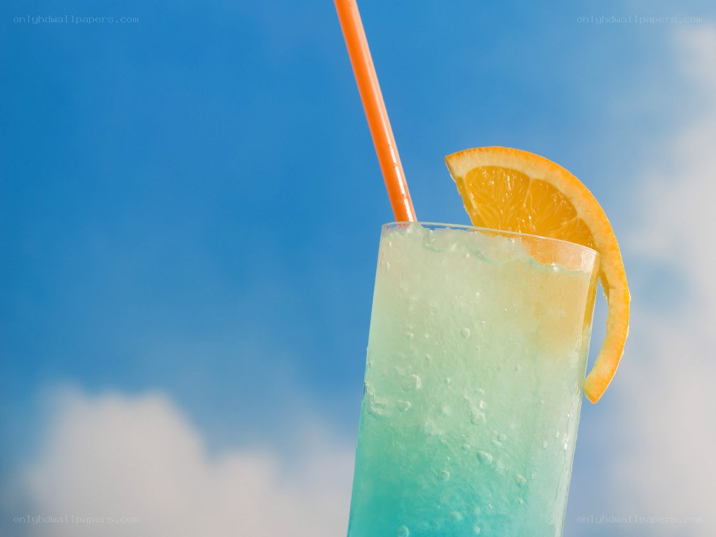 blue drink with orange slice
