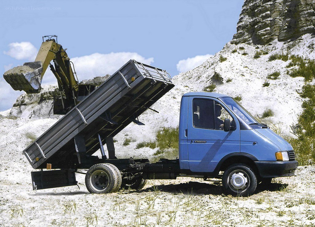 Blue dump truck at a quarry