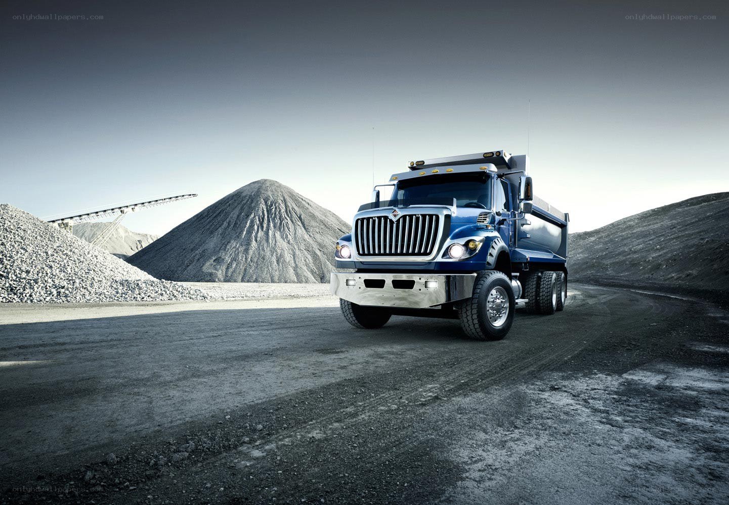 Blue dump truck in quarry