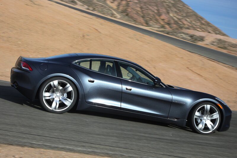 blue electric car on road