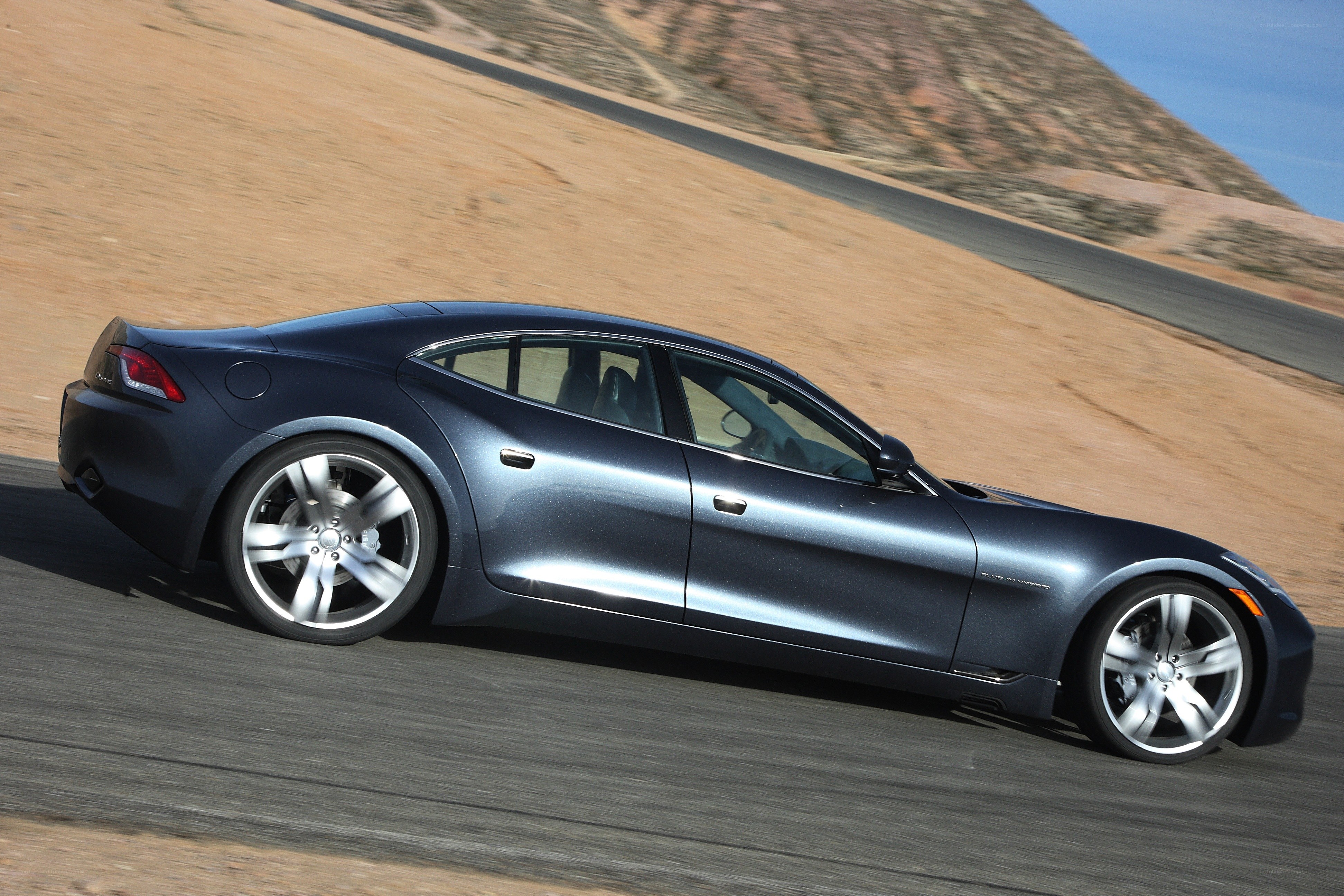 blue electric car on road