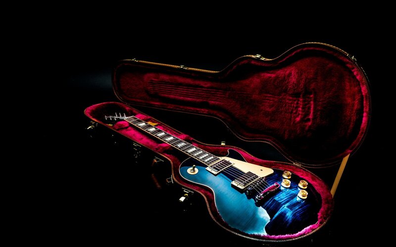 Blue Electric Guitar — Dramatic, Photograph, Guitar Case