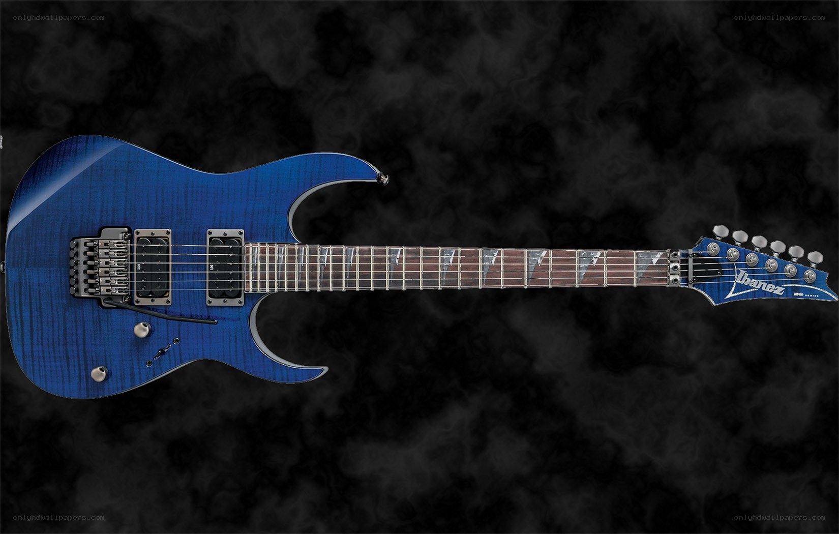 blue electric guitar on black background