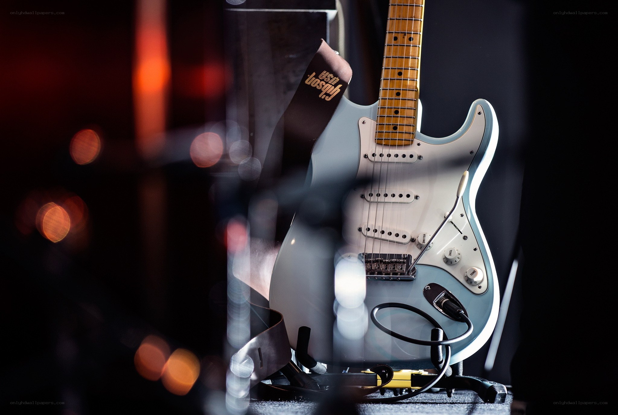 blue electric guitar on stage