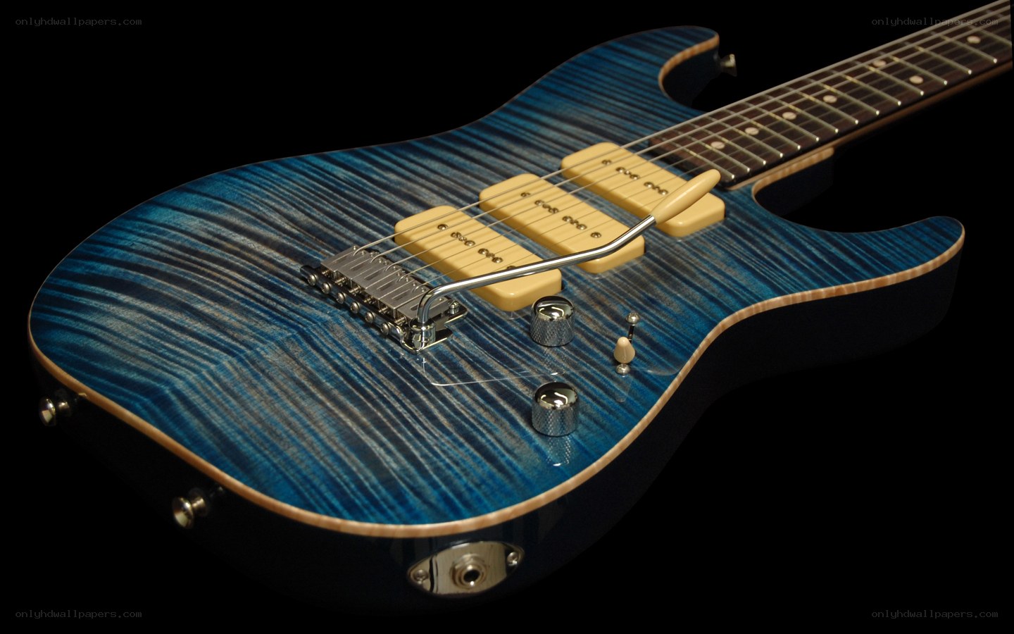 blue electric guitar with flame maple top