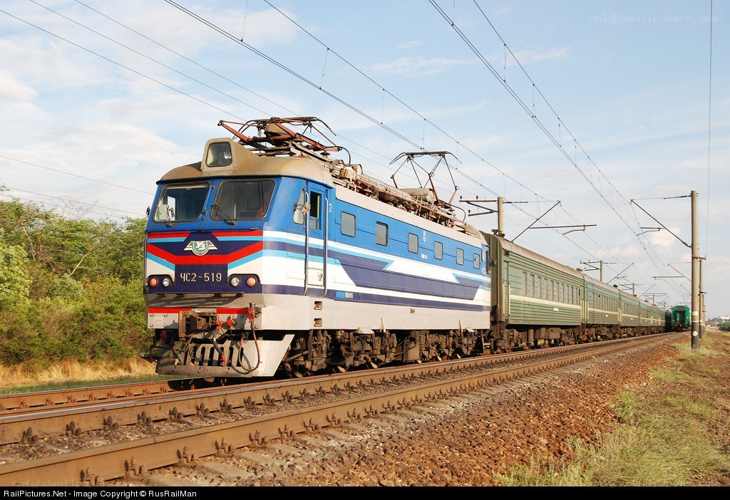 Blue electric locomotive pulling train