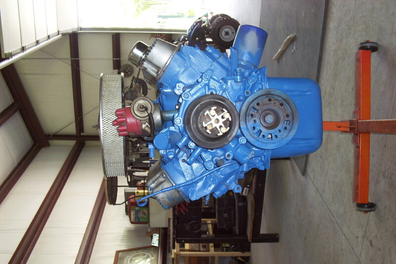 blue engine on a stand
