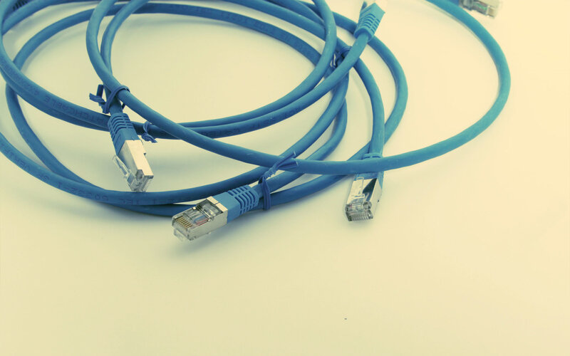 blue ethernet cables coiled