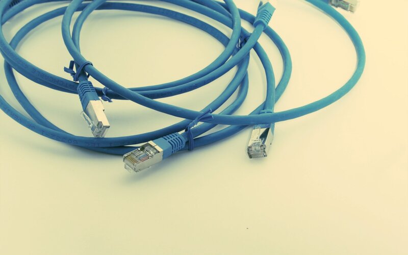 Blue Ethernet cables coiled