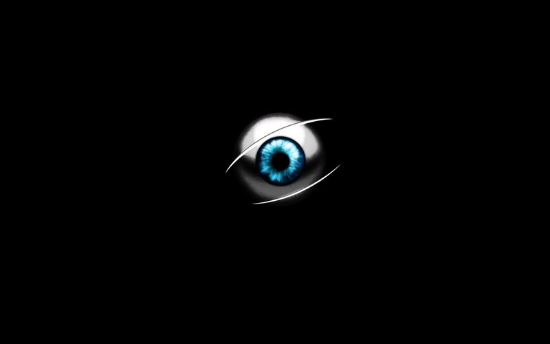 Blue Eye on Black Background — Dramatic
