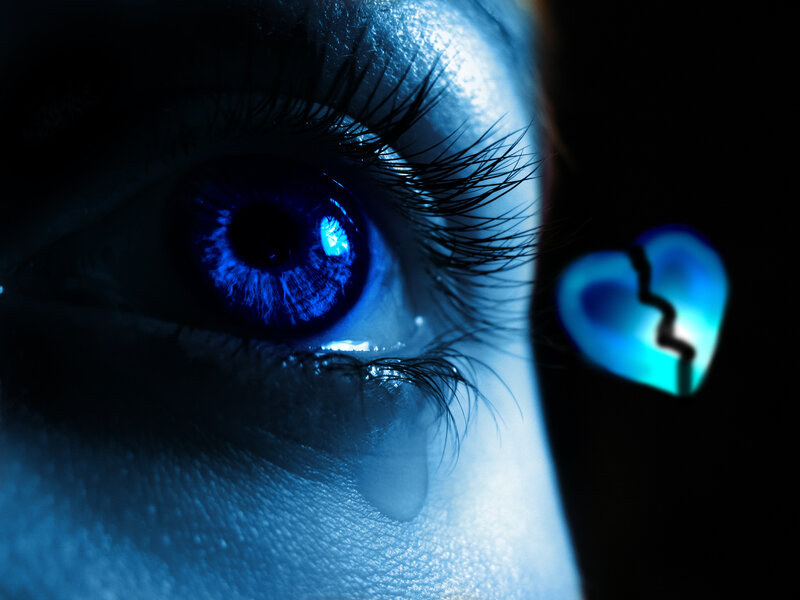 blue eye with broken heart