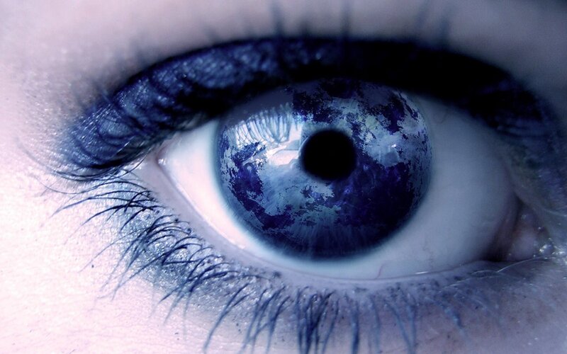 blue eye with cosmic pattern