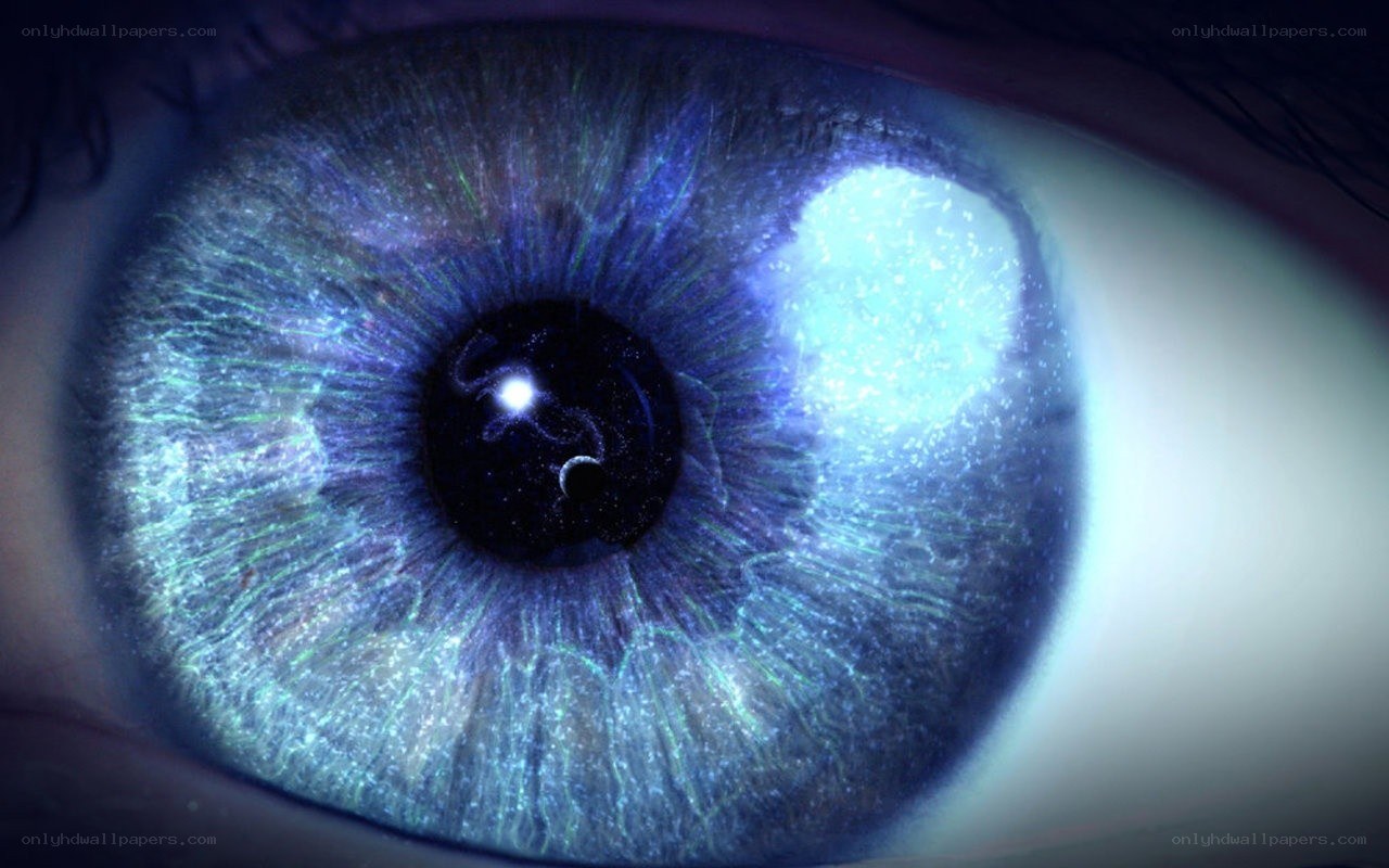 blue eye with galaxy in pupil