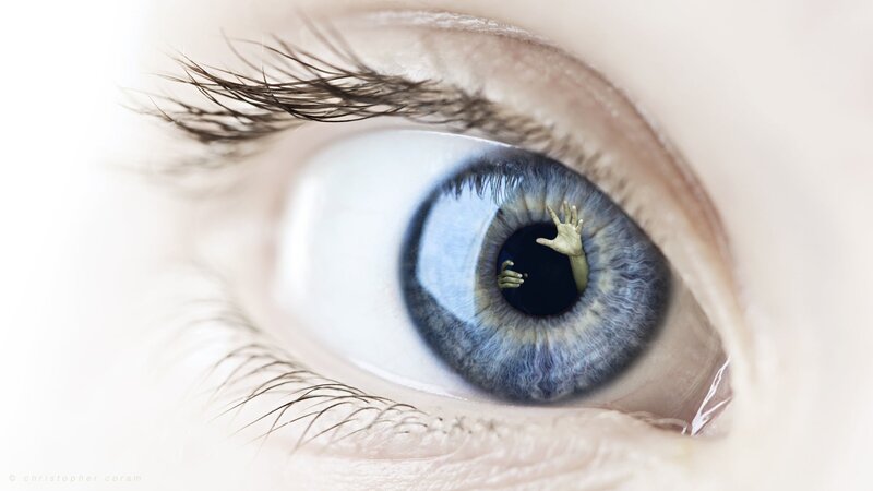 Blue Eye with Hand Reflection