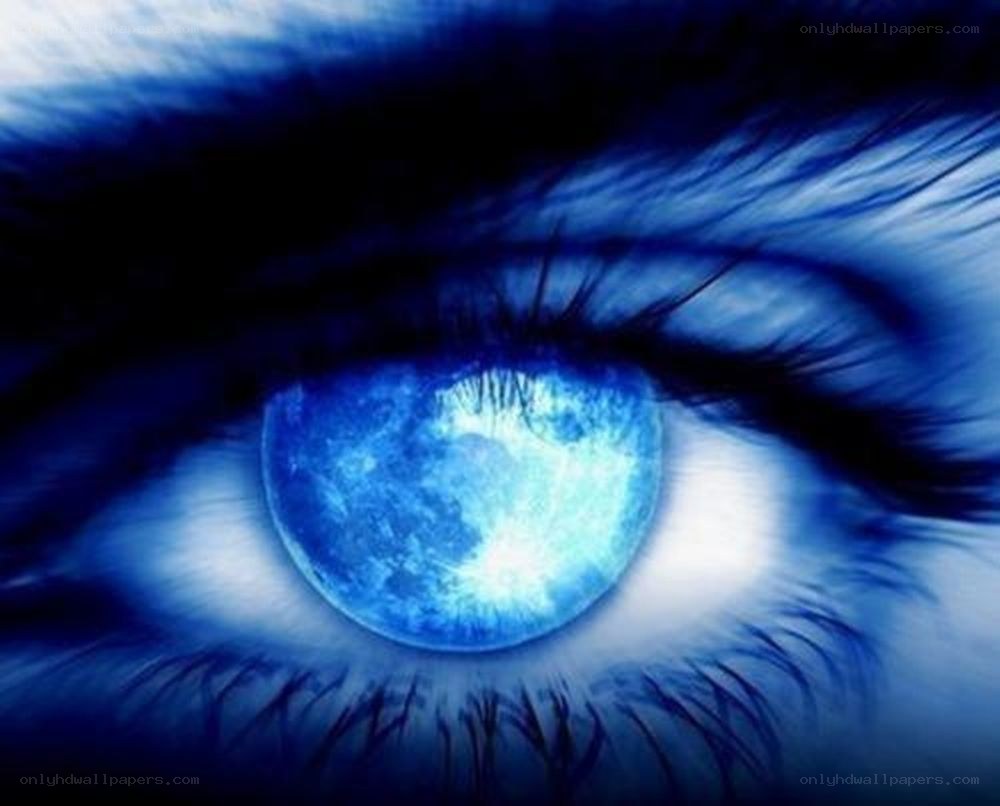 blue eye with moon reflection