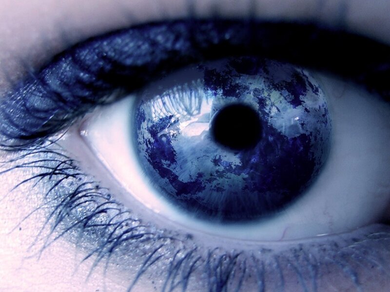blue eye with planet reflection