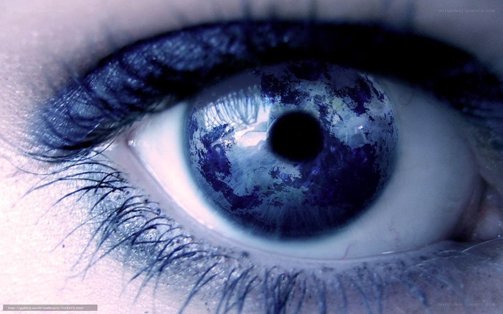 blue eye with planet reflection