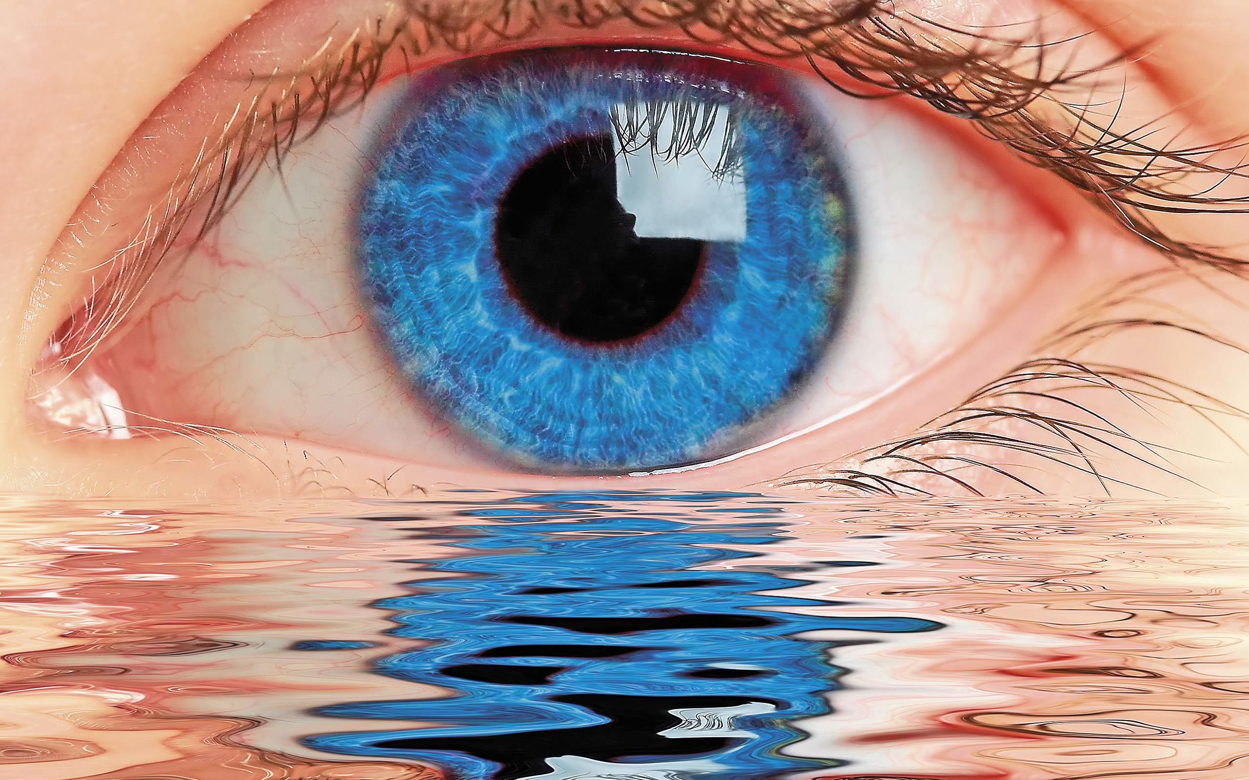blue eye with water reflection