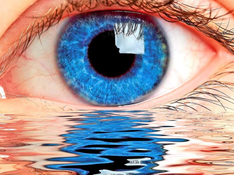Blue Eye with Water Reflection — Dramatic