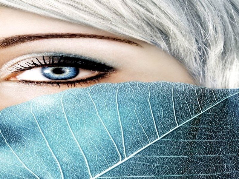 Blue-eyed Person with Leaf