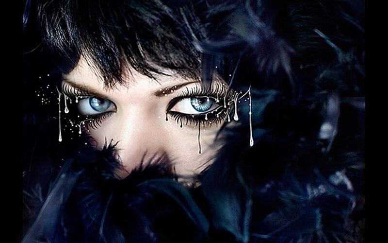 Blue-eyed Woman with Feathers