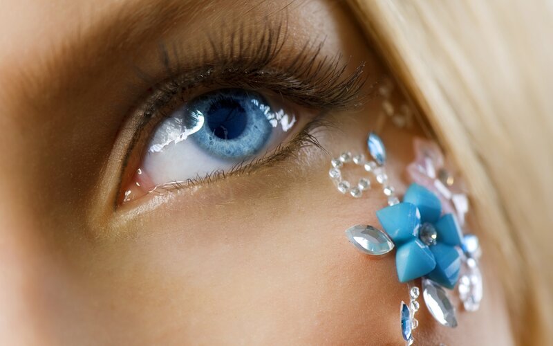 Blue-eyed Woman with Gems