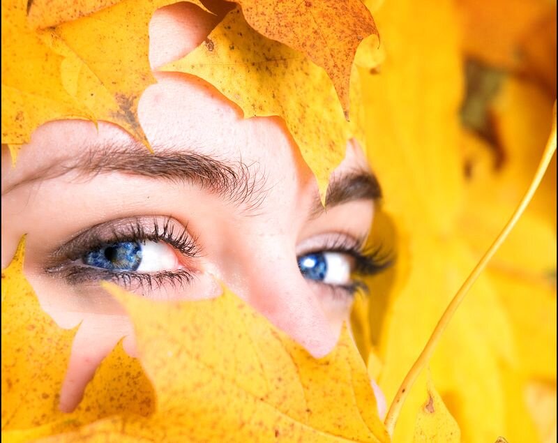 Blue-eyed Woman with Leaves