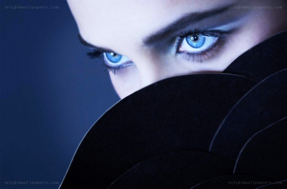 blue eyes behind dark mask