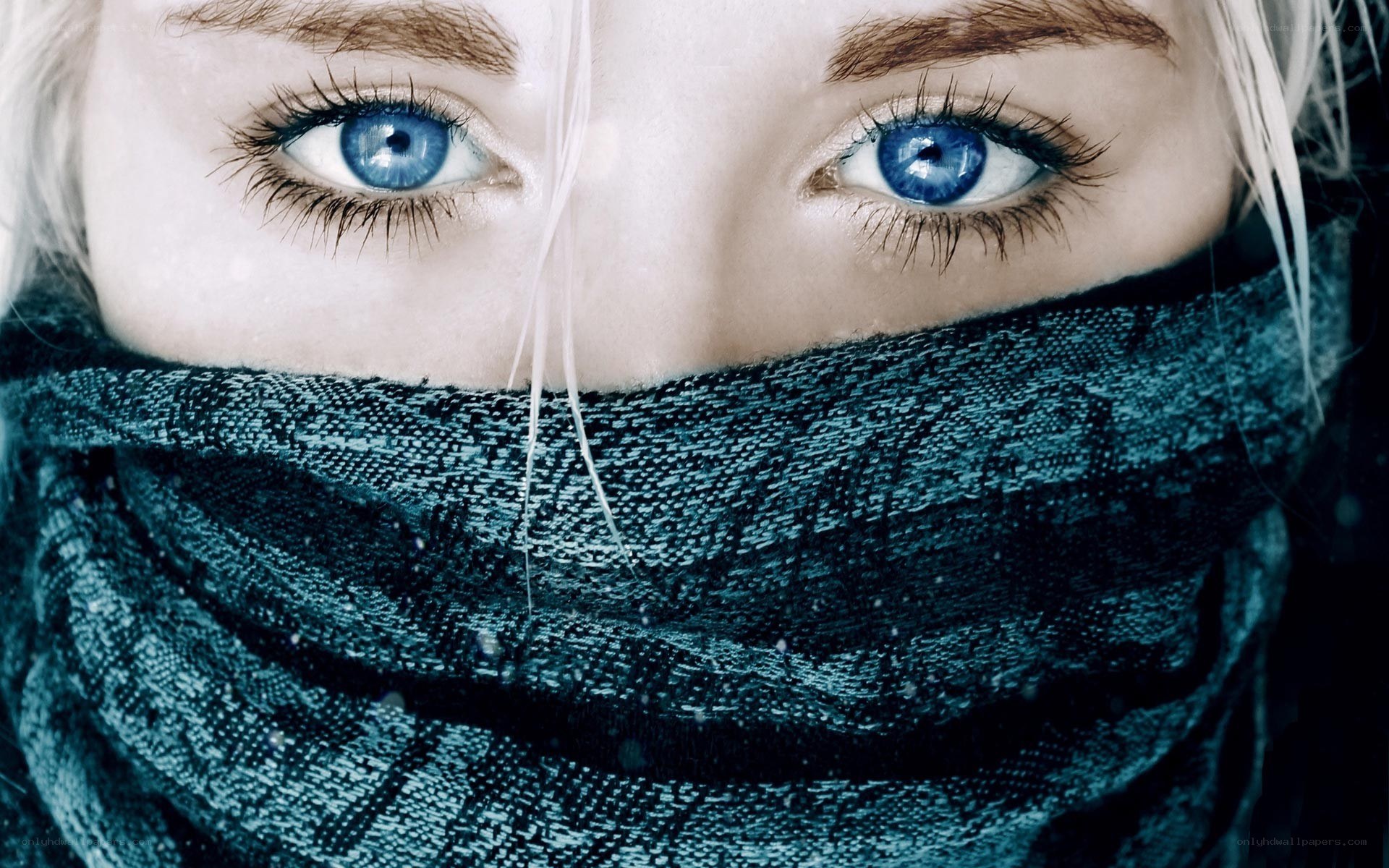 blue eyes in winter scarf