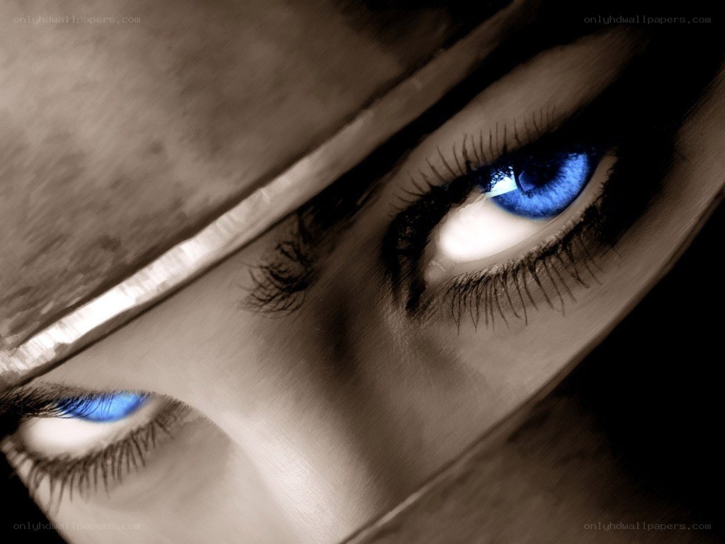 blue eyes under a hat