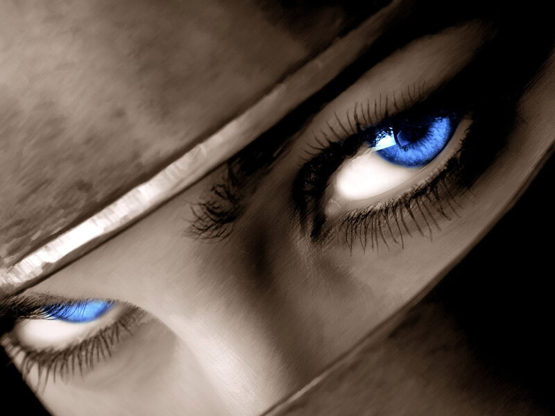 blue eyes under a hat
