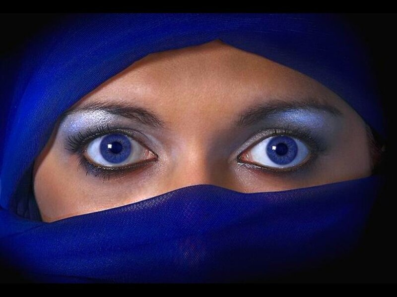 blue eyes under blue hijab