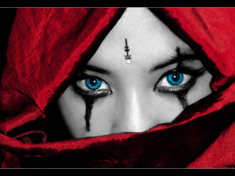 blue eyes under red hood