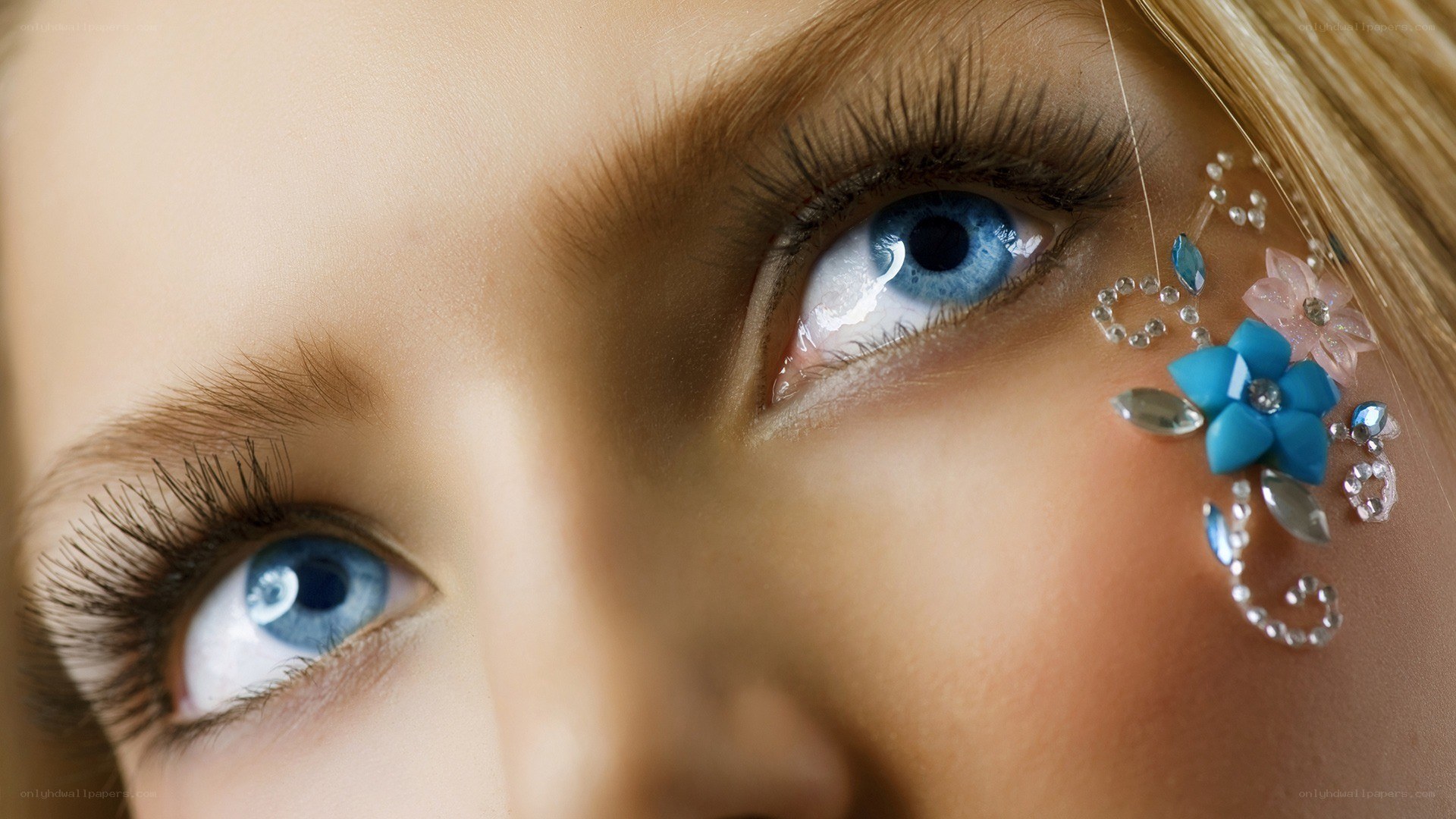 blue eyes with decorative gems