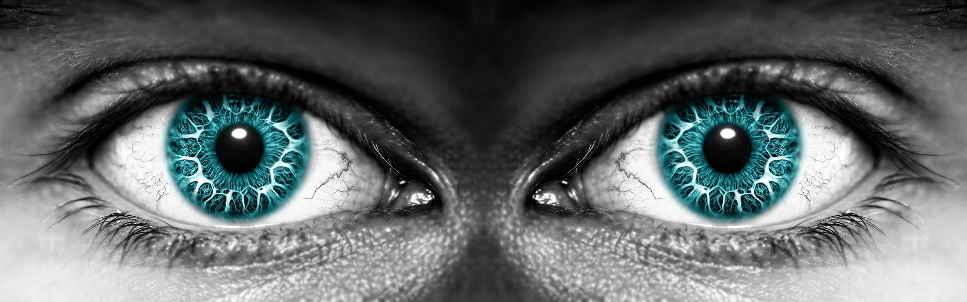 blue eyes with intricate patterns