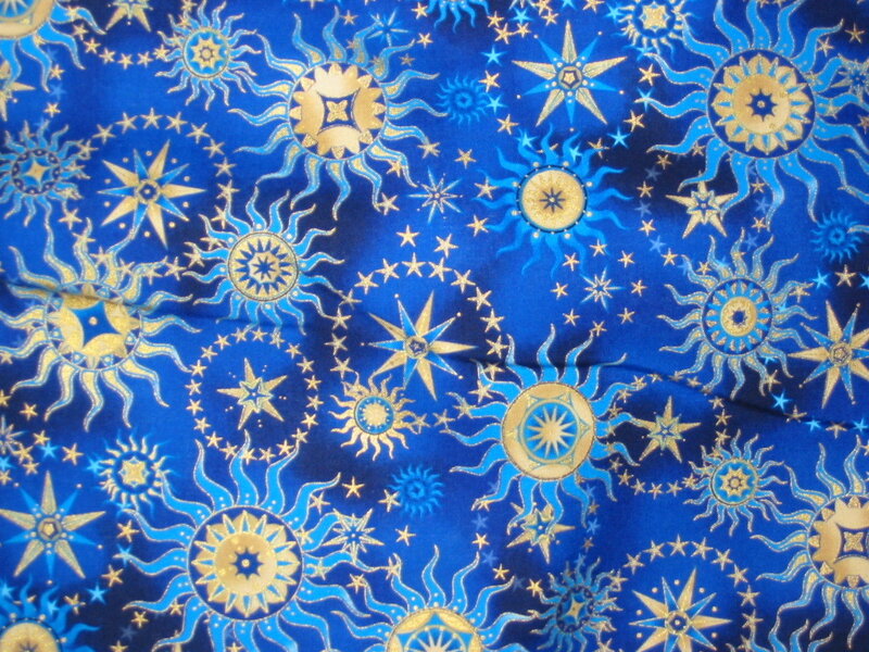 blue fabric with sun and star pattern