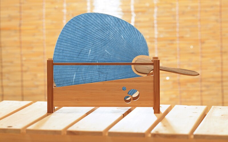 Blue fan on wooden stand