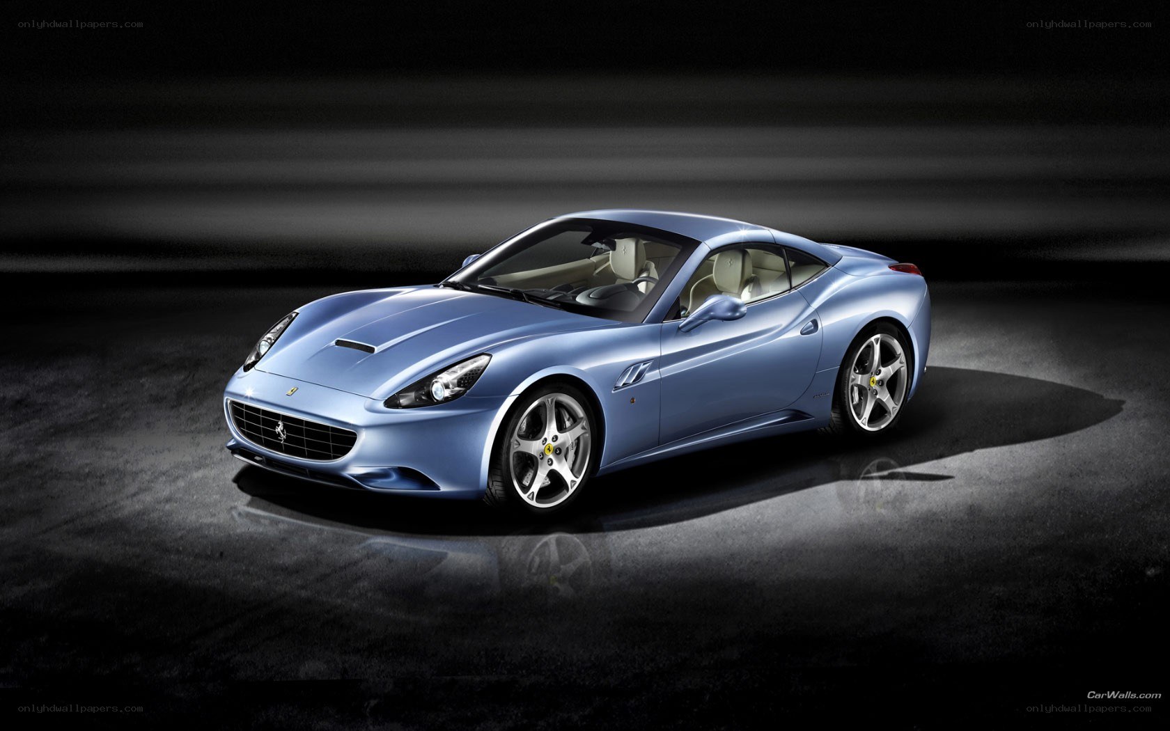 blue ferrari cabriolet