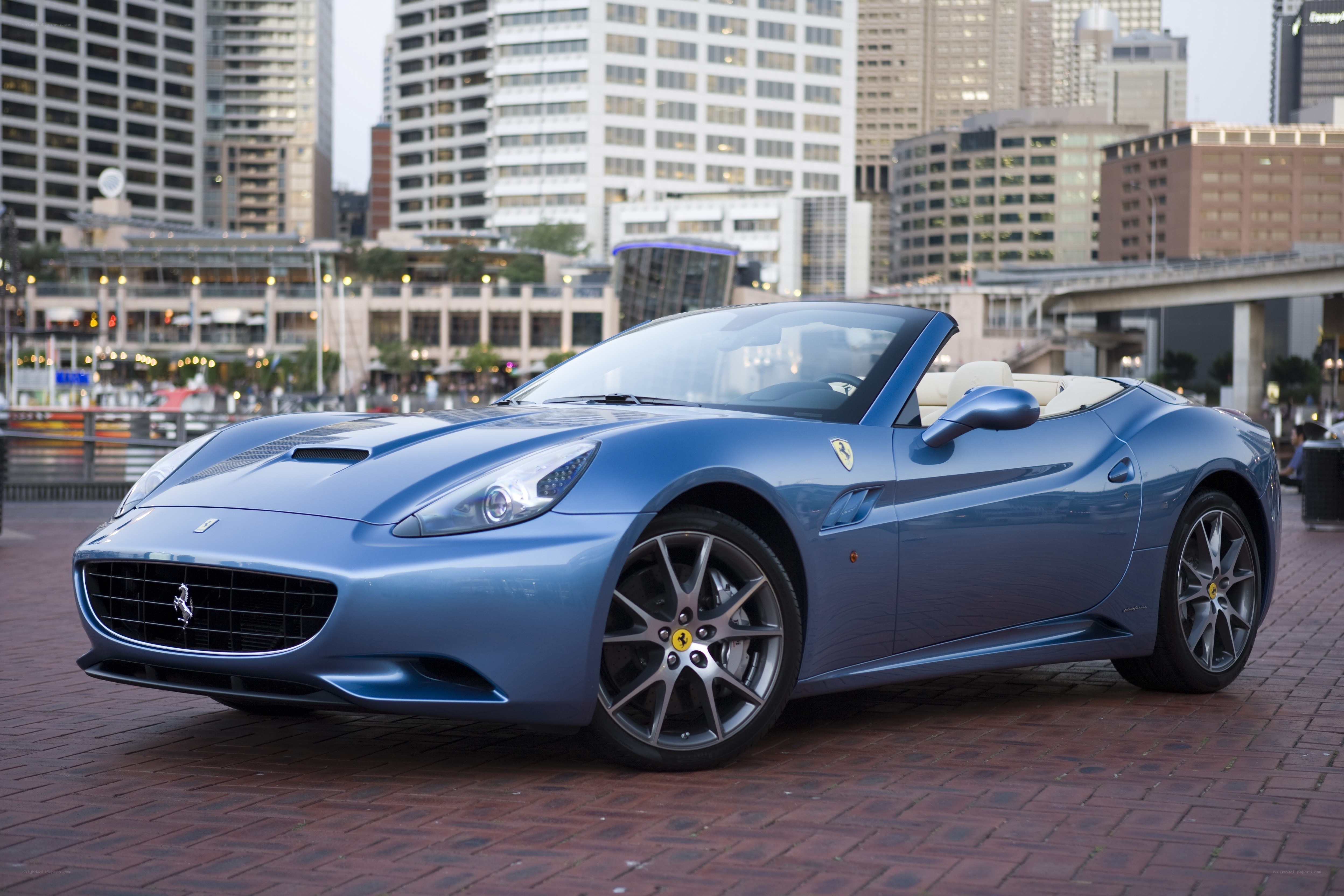 Blue Ferrari Cabriolet in City