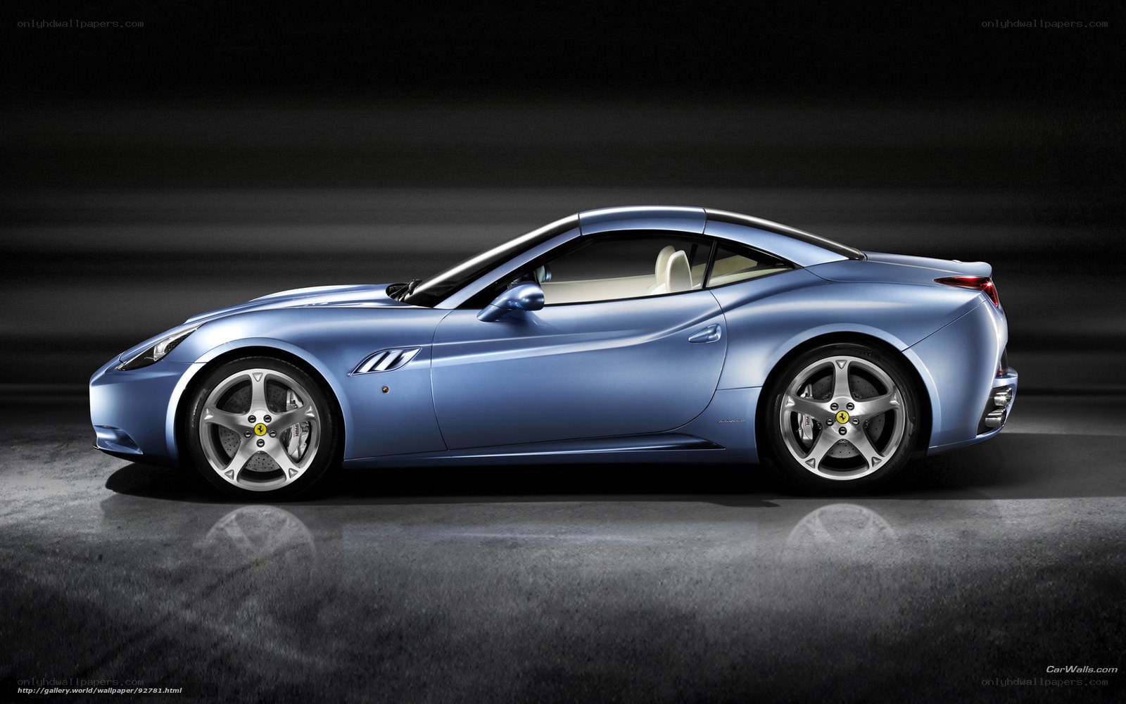 blue ferrari cabriolet