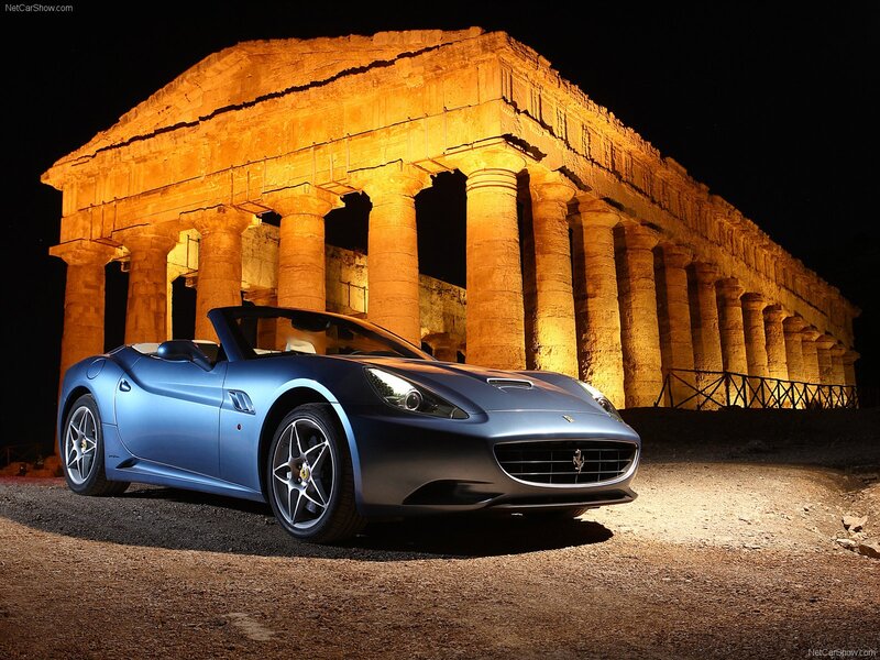 Blue Ferrari California at night