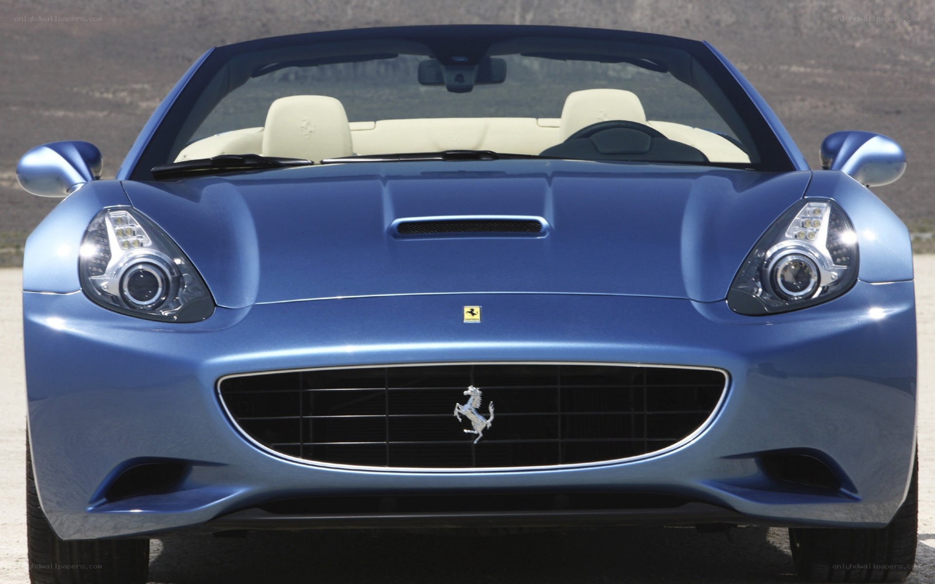 blue ferrari convertible