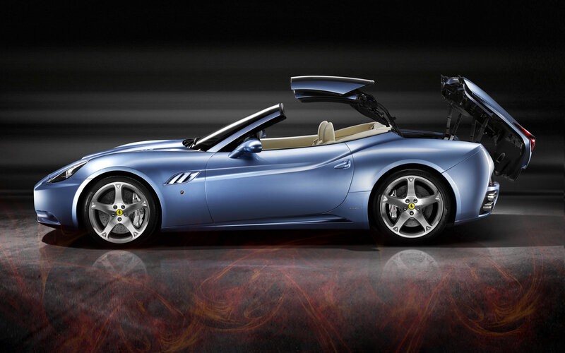 blue ferrari convertible car