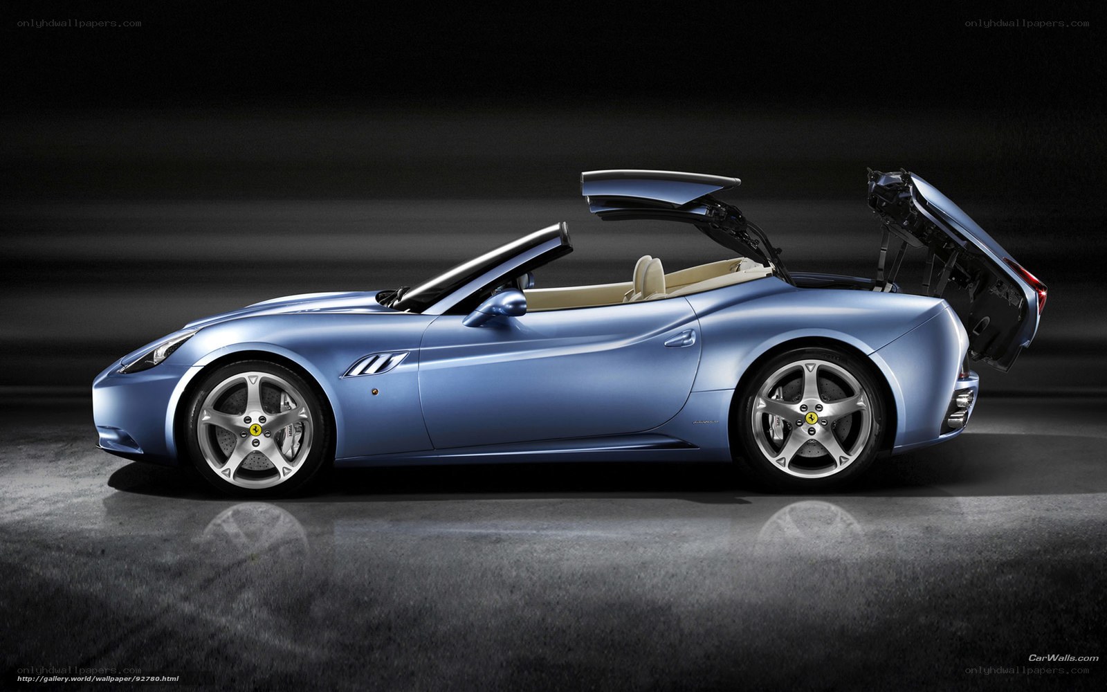 blue ferrari convertible car