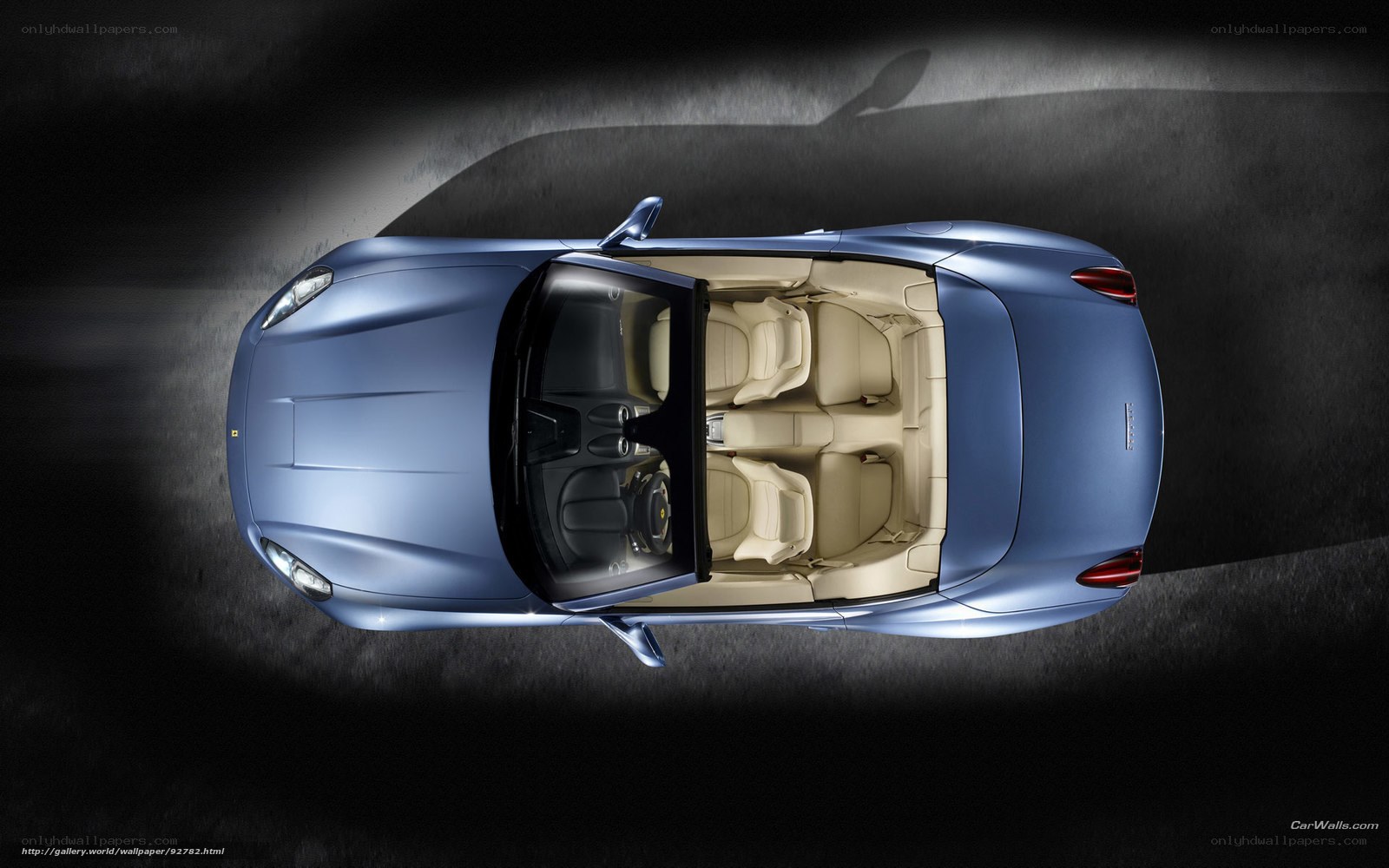 blue ferrari convertible interior