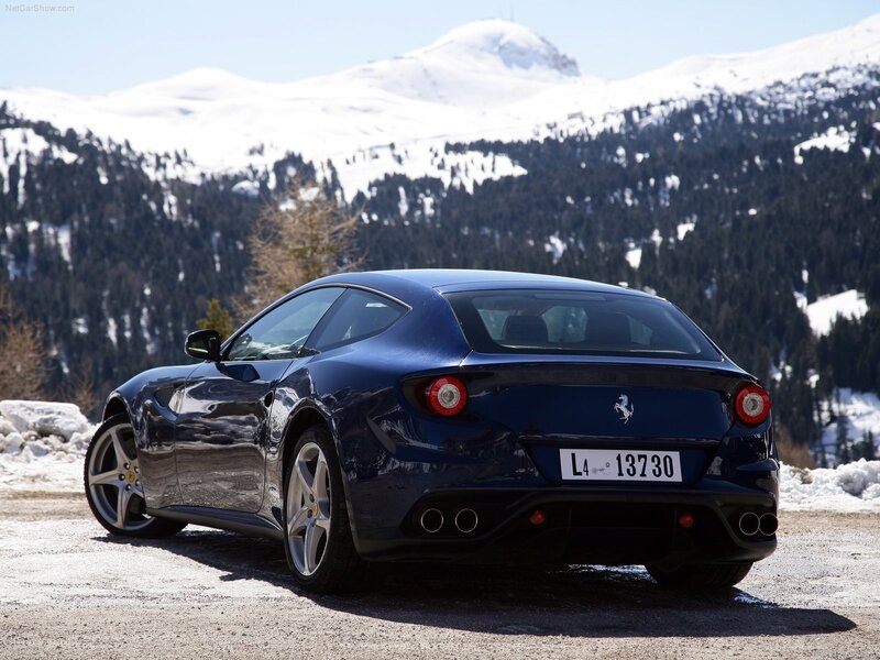 Blue Ferrari FF in snowy mountains